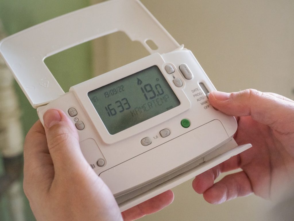 a-person-holding-a-device-yg19gb9jw0i a-person-holding-a-device-yg19gb9jw0i